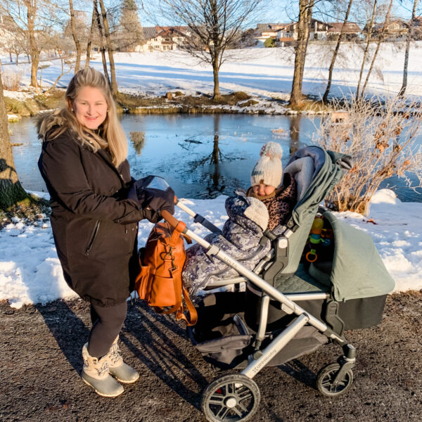 mom outside with double stroller uppababy vista