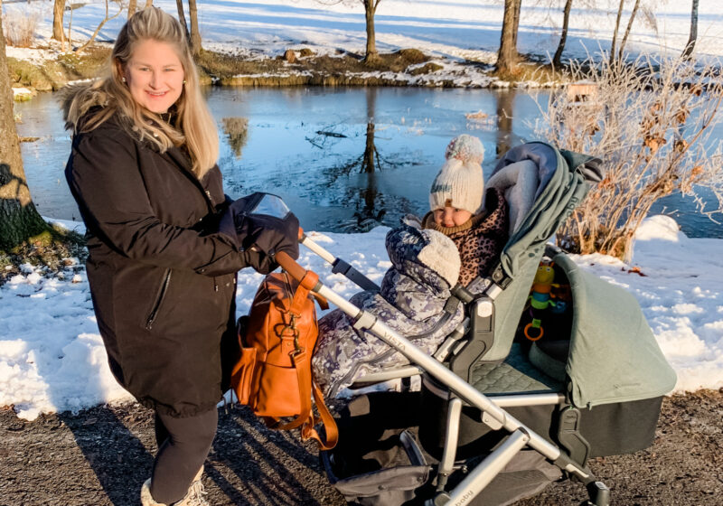 mom outside with double stroller uppababy vista