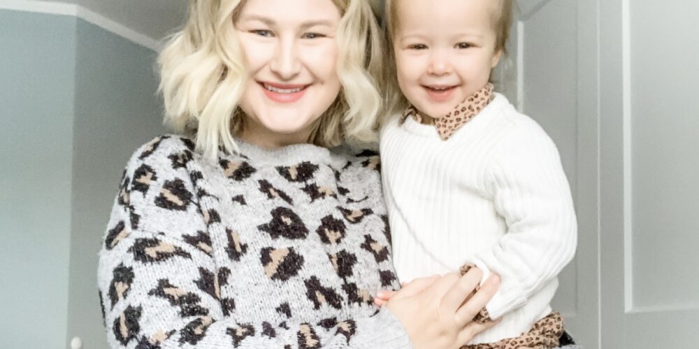 Mom and daughter with blonde hair.