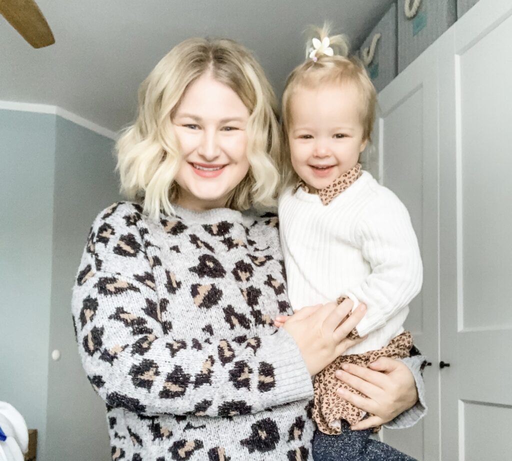 Mom and daughter with blonde hair. 