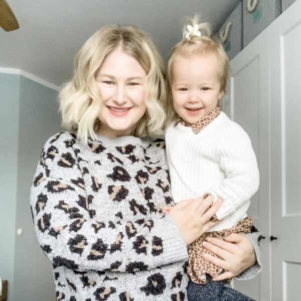 Mom and daughter with blonde hair.