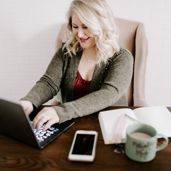 woman at computer for how to offer secure online payments.