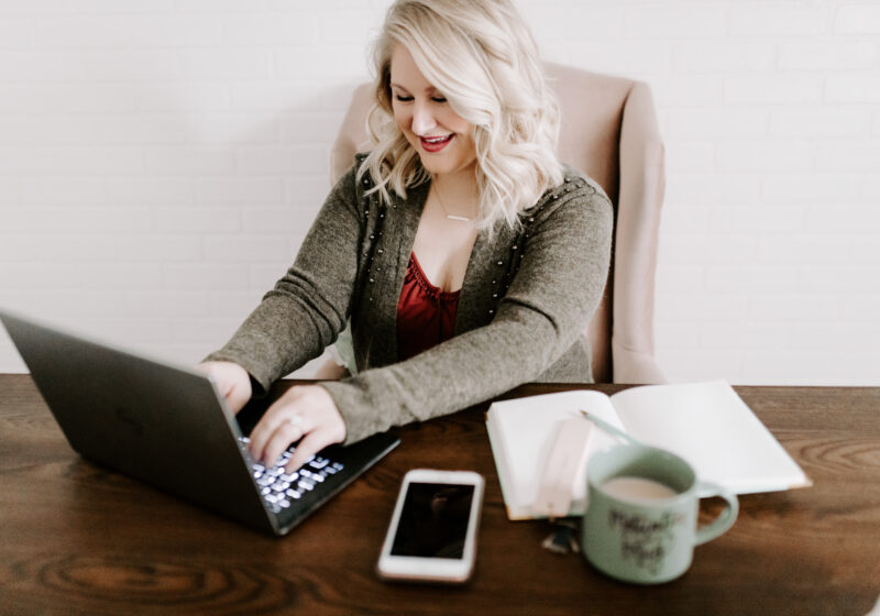 woman at computer for how to offer secure online payments.